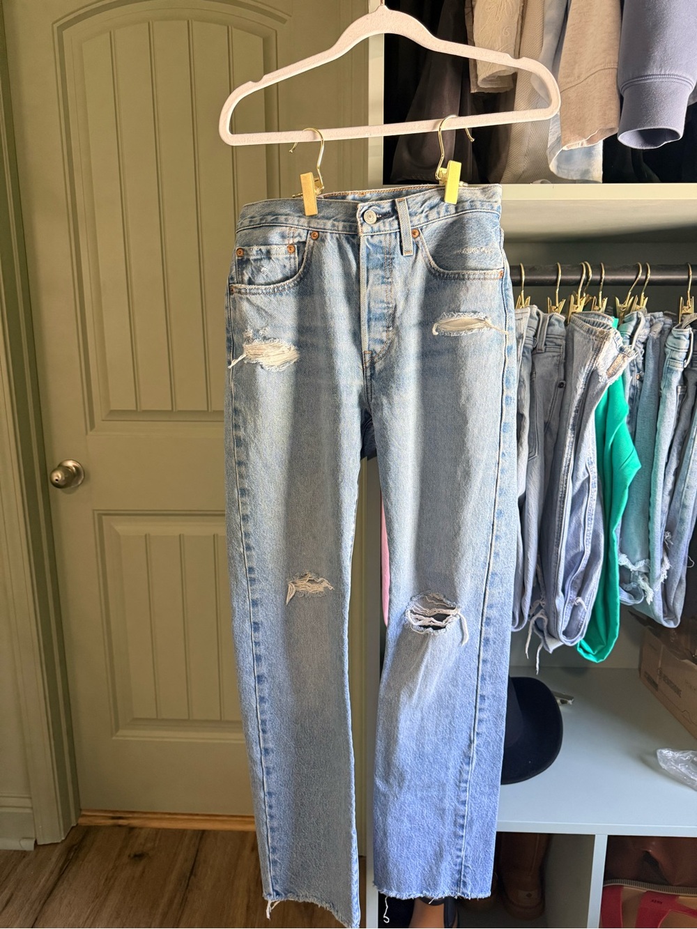 Levi’s 501 Light Blue Distressed High-Rise Straight Jeans